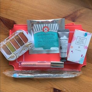 Ipsy glam bag and 6 makeup items